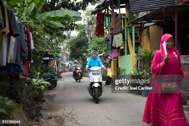 jakarta street life in indonesia - jakarta stock pictures, royalty-free photos & images