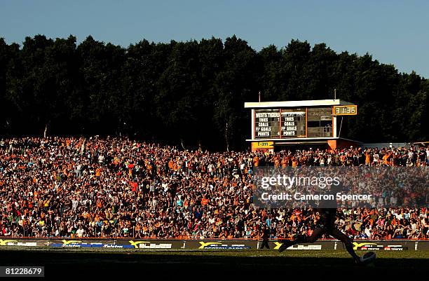 Brett Hodgson of the Tigers kicks for goal during the round 11 NRL match between the Wests Tigers and the Gold Coast Titans at Leichhardt Oval on May...