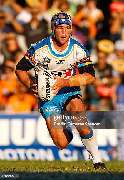 Nathan Friend of the Titans runs the ball during the round 11 NRL match between the Wests Tigers and the Gold Coast Titans at Leichhardt Oval on May...