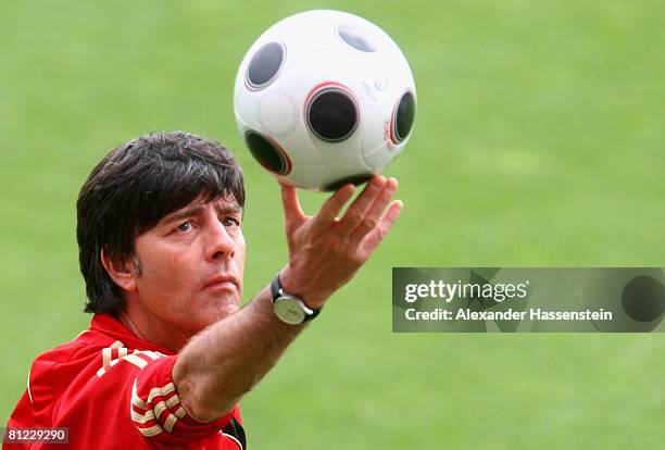 Joachim Loew, head coach of the German national team, plays with the ball during a training session at the Son Moix stadium on May 25, 2008 in...