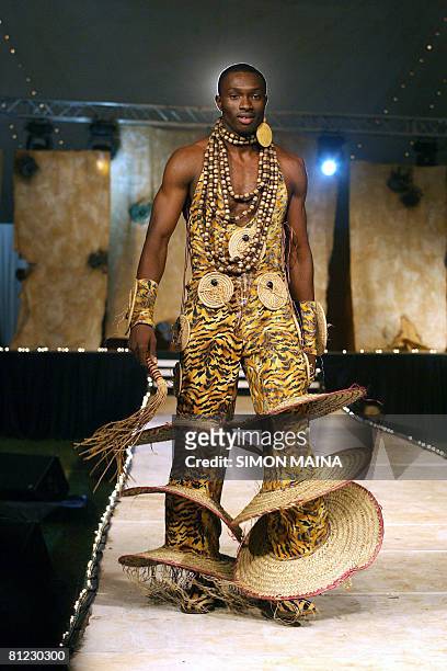 Model presents a Modela Couture creation by Nigerian designer Bayo Adegbe, on May 24, 2008 during the "Fashion for Peace" show in Nairobi. AFP PHOTO/...