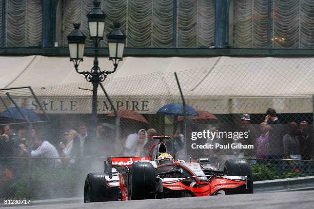 Lewis Hamilton of Great Britain and McLaren Mercedes drives through Casino Square on his way to victory in the Monaco Formula One Grand Prix at the...