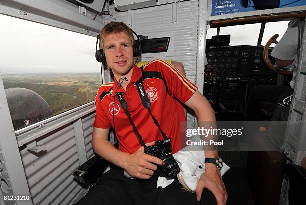 Per Mertesacker sits in a plane of Typ JU 52 during a round fly sponsored by watch manufactrer WC Schaffhausen on May 25, 2008 in Mallorca, Spain.