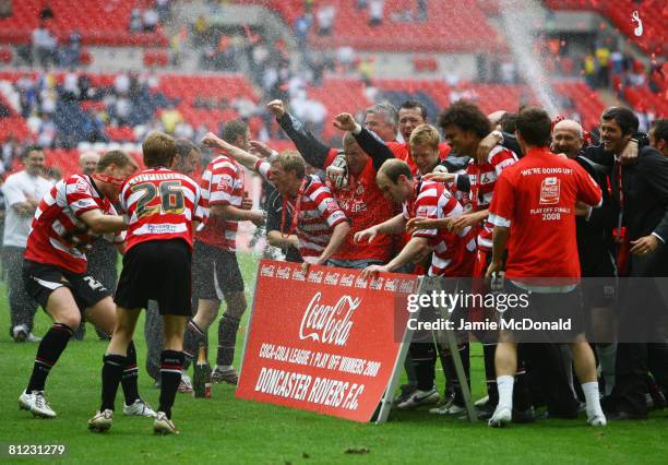 Doncaster Rovers players celebrate victory following the Coca Cola League 1 Playoff Final match between Leeds United and Doncaster Rovers at Wembley...