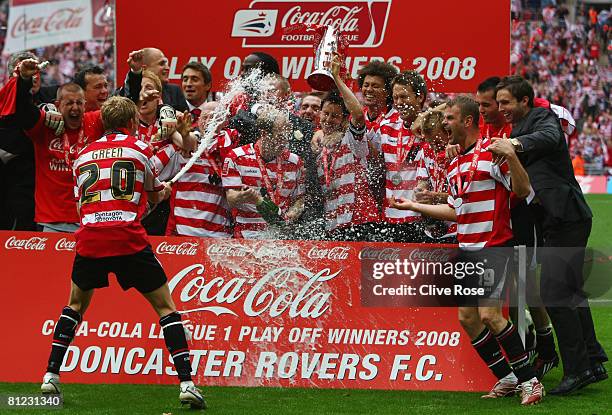 Doncaster Rovers players celebrate victory following the Coca Cola League 1 Playoff Final match between Leeds United and Doncaster Rovers at Wembley...