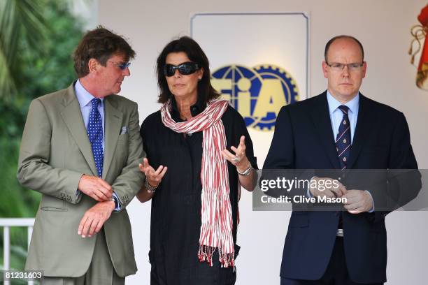 Prince Ernst August of Hanover, Princess Caroline of Hanover and Prince Albert II of Monaco prepare to present the winners trophy on the podium...