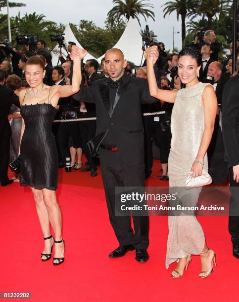 Actress Elli Medeiros, director Pablo Trapero and actress Martina Gusman arrive at the Palme d'Or Closing Ceremony at the Palais des Festivals during...