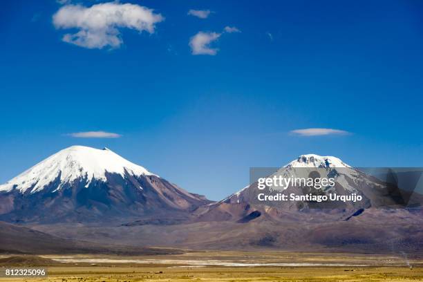 pomerape and parinacota volcanoes - summit day 2 stock pictures, royalty-free photos & images