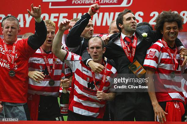 Gareth Roberts of Doncaster Rovers and team mates celebrate victory following the Coca Cola League 1 Playoff Final match between Leeds United and...