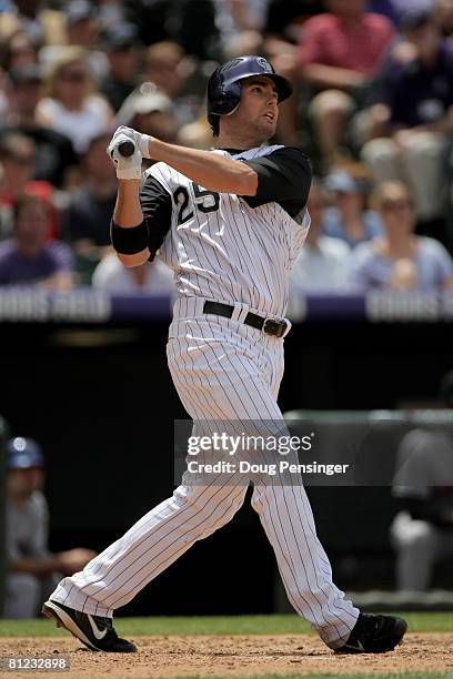 Seth Smith of the Colorado Rockies watches his first career home run that scored Ryan Spilborghs and Todd Helton to give the Rockies a 3-1 lead over...