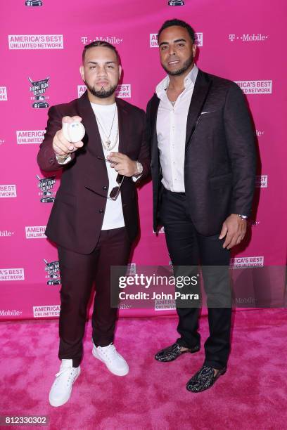 Lejuan James and Nelson Cruz arrive at the T-Mobile Presents Derby After Dark at Faena Forum on July 10, 2017 in Miami Beach, Florida.