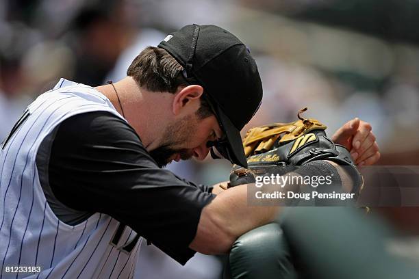First baseman Todd Helton of the Colorado Rockies prepares to take the field against the New York Mets at Coors Field on May 25, 2008 in Denver,...