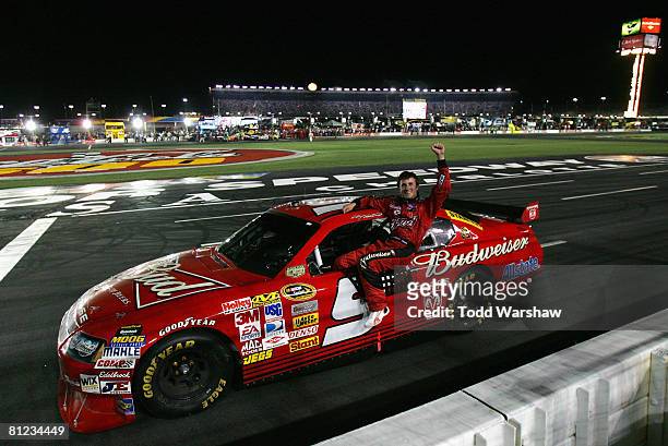 Kasey Kahne, driver of the Budweiser Dodge, celebrates after winning the NASCAR Sprint Cup Series Coca-Cola 600 on May 25, 2008 at Lowe's Motor...
