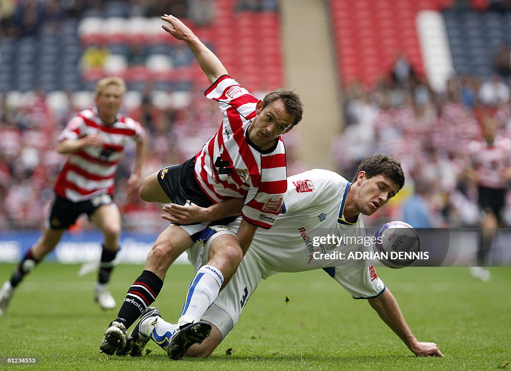 Leeds United's Lubomir Michalik (R) tack