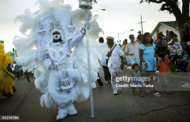 Mardi Grad Indian marches in the annual Super Sunday second line parade May 25, 2008 in New Orleans, Louisiana. The parade features Mardi Gras...