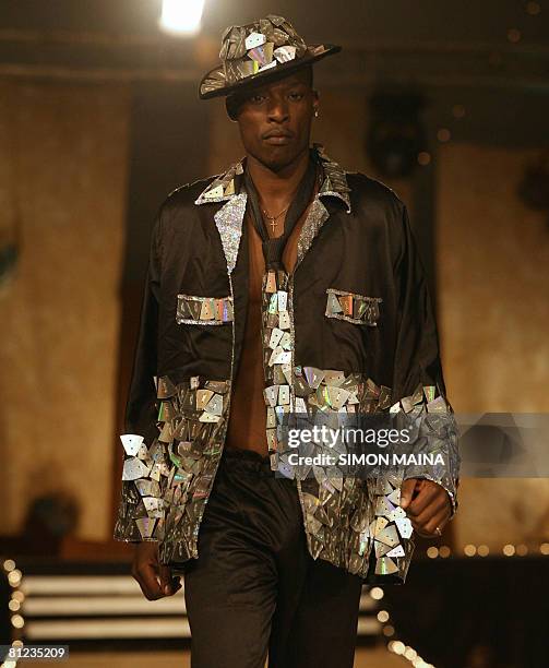 Model presents creations by Nigerian designer Bayo Adegbe on May 24, 2008 during the "Fashion for Peace" show in Nairobi. African fashion designers...