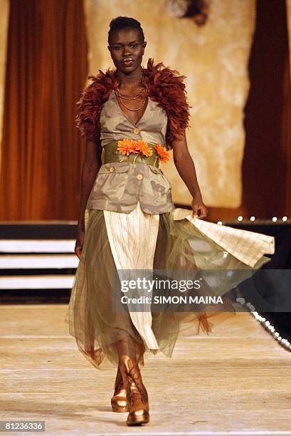Model presents creations by Nigerian designer Bayo Adegbe on May 24, 2008 during the "Fashion for Peace" show in Nairobi. African fashion designers...
