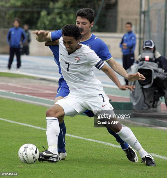 Italian Bocchetti Salvatore vies with US Hill Kamani during the 36th edition of the international under 21 football event, in Toulon, on May 25,...