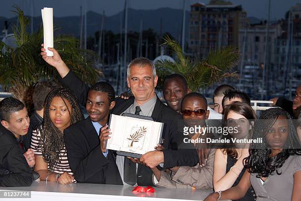 Director Laurent Cantet, winner of the Palme d'Or Award for the film "Entre Les Murs", poses at the Palme d'Or closing ceremony photocall at the...