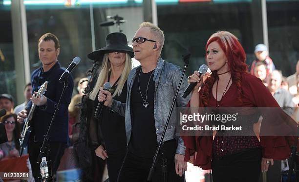 Keith Strickland, Cynthia Leigh Wilson, Fred Schneider and Kate Pierson of the music group The B-52's perform live on NBC's "Today" Show on May 26,...