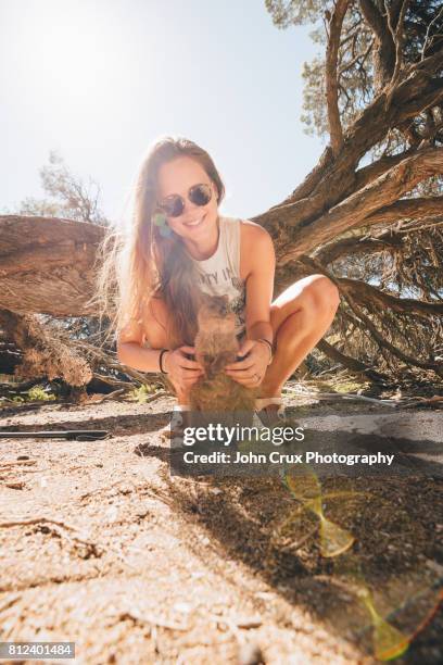 girl and quokka - quokka imagens e fotografias de stock