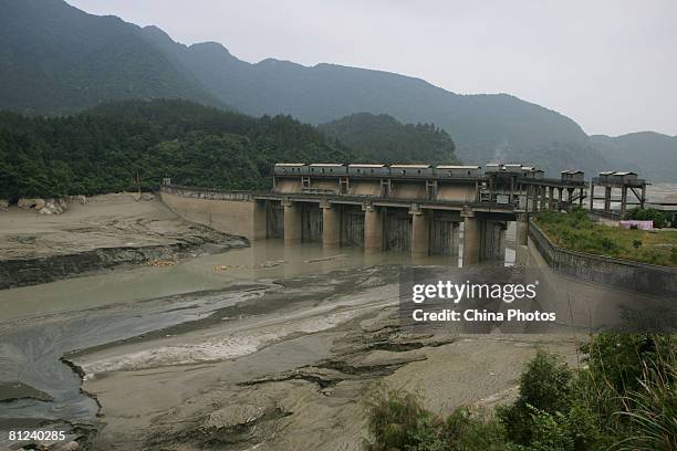 The hydropower station located at the lower of Tangjiashan Quake Lake, which has been opend as preparation for discharging flood, is seen on May 26,...