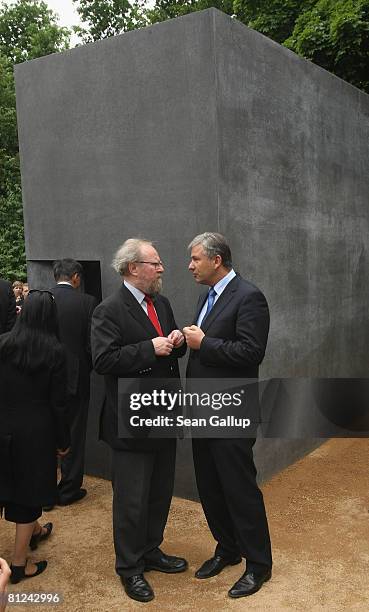 Berlin mayor and openly gay Klaus Wowereit and former Bundestag president Wolfgang Thierse stand in front of the just-inaugurated memorial to...