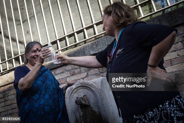Pinuccia Montanari,Vandana Shiva during a Flash Mob Earth Associations gather to defend the public good water and to ask the mayor of Rome Virginia...