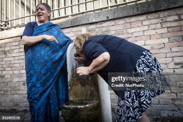 Pinuccia Montanari,Vandana Shiva during a Flash Mob Earth Associations gather to defend the public good water and to ask the mayor of Rome Virginia...