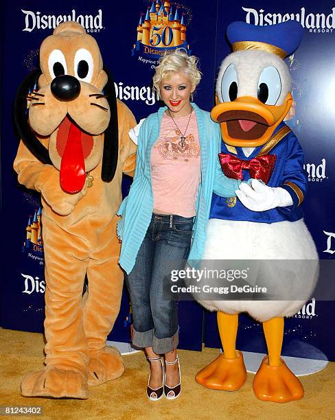 Christina Aguilera with Pluto and Donald Duck