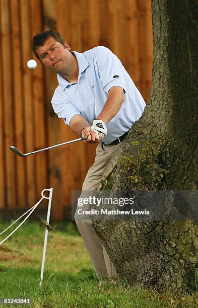 Matthew Paget of Royal Mid-Surrey Golf Club chips onto the 12th green during the Gulf Air International Pro-Captain Challenge Regional South...