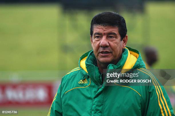 Joel Santana, newly appointed coach of the South African football team known as Bafana Bafana, speaks to the team during their first practice session...