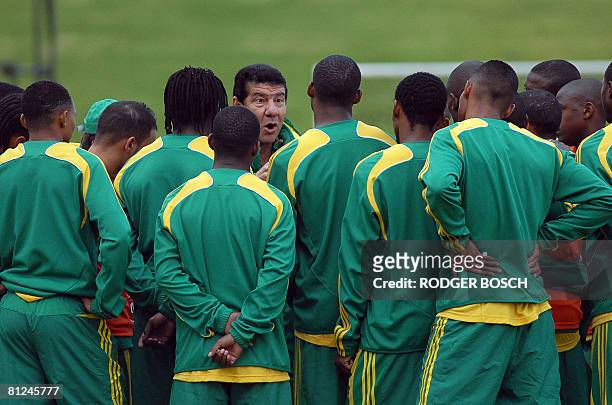 Joel Santana , newly appointed coach of the South African football team known as Bafana Bafana, speaks to the team during their first practice...
