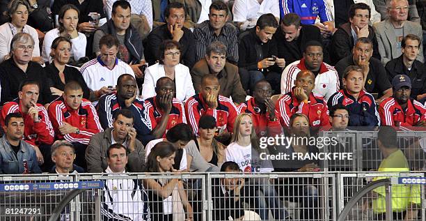 French football team players watch their teammates during the friendly football match France vs. Ecuador ahead of the Europe 2008 tournament, on May...