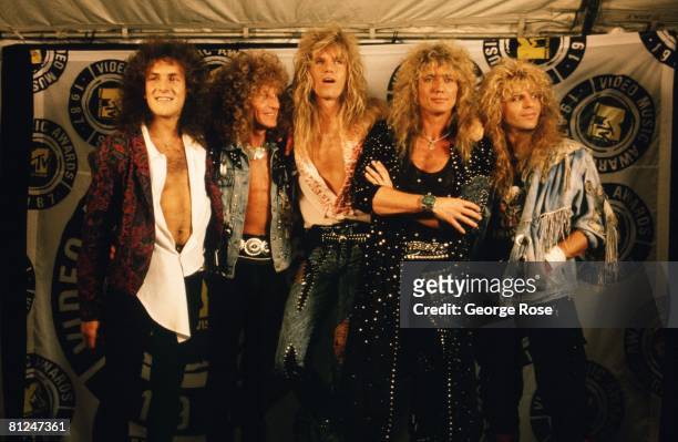 The rock group, "Whitesnake," poses on the red carpet at the 1987 Universal City, California, MTV Music Awards.