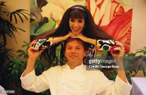 Chef to the stars, Wolfgang Puck, playfully poses with his wife and business partner, Barbara Lazaroff, in this 1986 West Hollywood, California,...