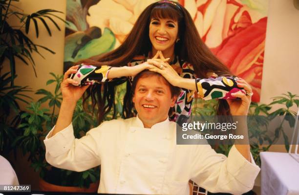 Chef to the stars, Wolfgang Puck, playfully poses with his wife and business partner, Barbara Lazaroff, in this 1986 West Hollywood, California,...