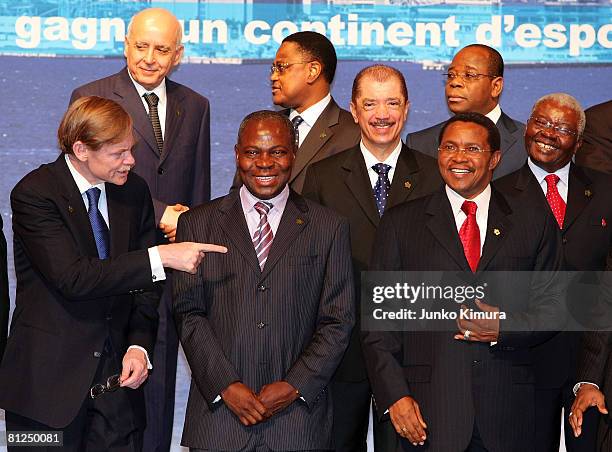 World Bank President Robert Zoellick and Tanzanian President Jakaya Mrisho Kikwete pose with other leaders of nations and organizations during the...