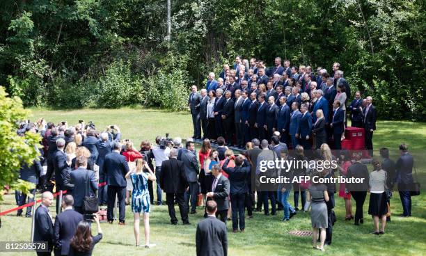 Austrian Foreign Minister Sebastian Kurz and Russian Minister of Foreign Affairs Sergei Lavrov pose for a family photo with other participants of the...