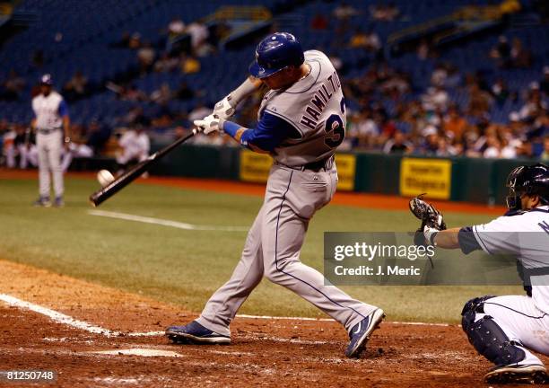 Outfielder Josh Hamilton of the Texas Rangers hits a grand slam home run against of the Tampa Bay Rays during the eighth inning of the game on May...