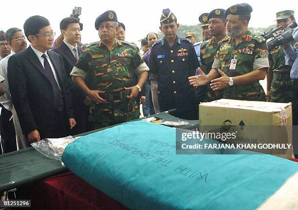 Zheng Qingdian Chinese ambassador in Bangladesh, and Lieutenant General Masud Uddin Chowdhury , principal staff officer of the Armed forces division,...