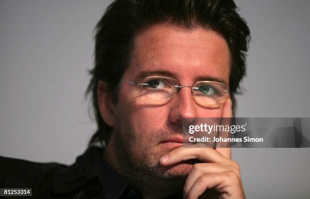 Danish Icelandic artist Olafur Eliasson looks on during a press conference prior to the opening of the exhibition "Your Mobile Expectations: BMW H2R...