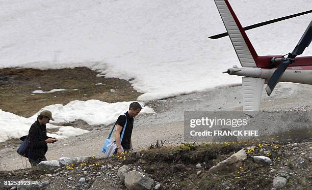 French goalkeeper Mickael Landreau and French defender Julien Escude leave Tignes, French Alps, on May 28 after they trained prior to the Euro 2008...