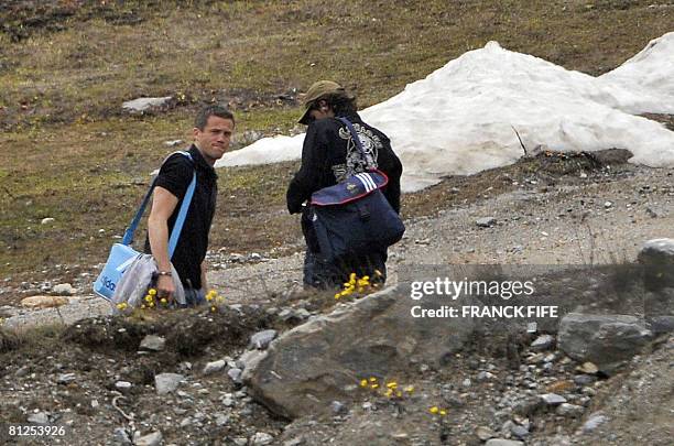 French goalkeeper Mickael Landreau and French defender Julien Escude leave Tignes, French Alps, on May 28 after they trained prior to the Euro 2008...
