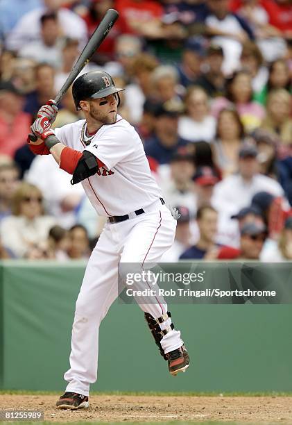 Dustin Pedroia of the Boston Red Sox bats against the Milwaukee Brewers on May 18, 2008 at Fenway Park in Boston, Massachusetts. The Red Sox defeated...