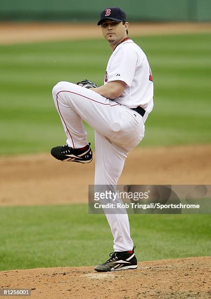 Josh Beckett of the Boston Red Sox pitches against the Milwaukee Brewers on May 18, 2008 at Fenway Park in Boston, Massachusetts. The Red Sox...