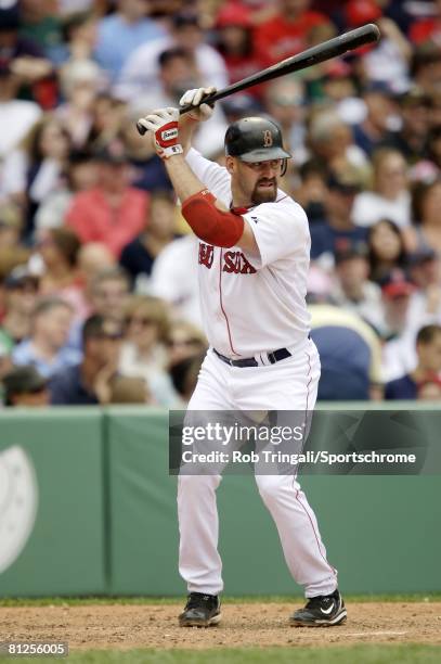 Kevin Youkilis of the Boston Red Sox bats against the Milwaukee Brewers on May 18, 2008 at Fenway Park in Boston, Massachusetts. The Red Sox defeated...