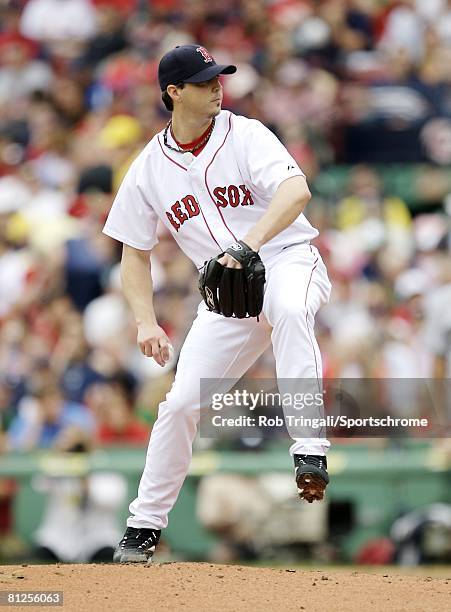 Josh Beckett of the Boston Red Sox pitches against the Milwaukee Brewers on May 18, 2008 at Fenway Park in Boston, Massachusetts. The Red Sox...