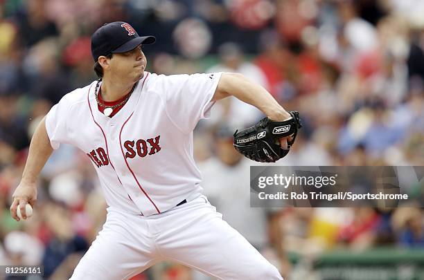 Josh Beckett of the Boston Red Sox pitches against the Milwaukee Brewers on May 18, 2008 at Fenway Park in Boston, Massachusetts. The Red Sox...