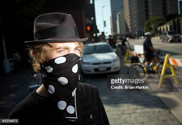 Zack Cicoine, of Dallas, participates in protest outside the ExxonMobil annual shareholders meeting at the Morton H. Meyerson Symphony Center May 28,...